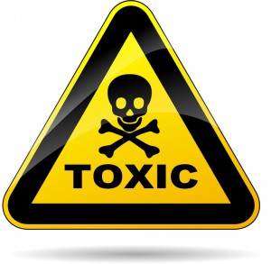 illustration of yellow triangle sign for toxicity